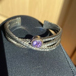 Purple stone with 14 k encasing and silver 925